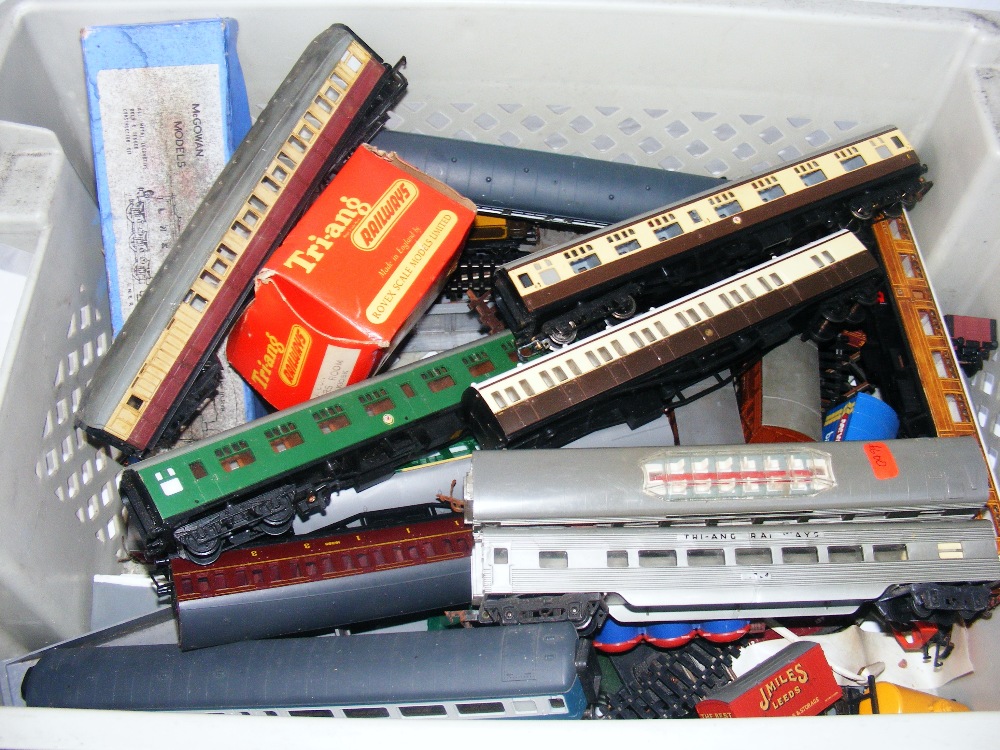 A box of 00 Gauge carriages, wagons etc.