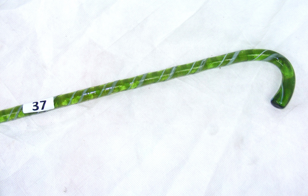 An antique Victorian Nailsea style glass walking cane measuring 99cm long.   CONDITION REPORT:  No - Image 2 of 2