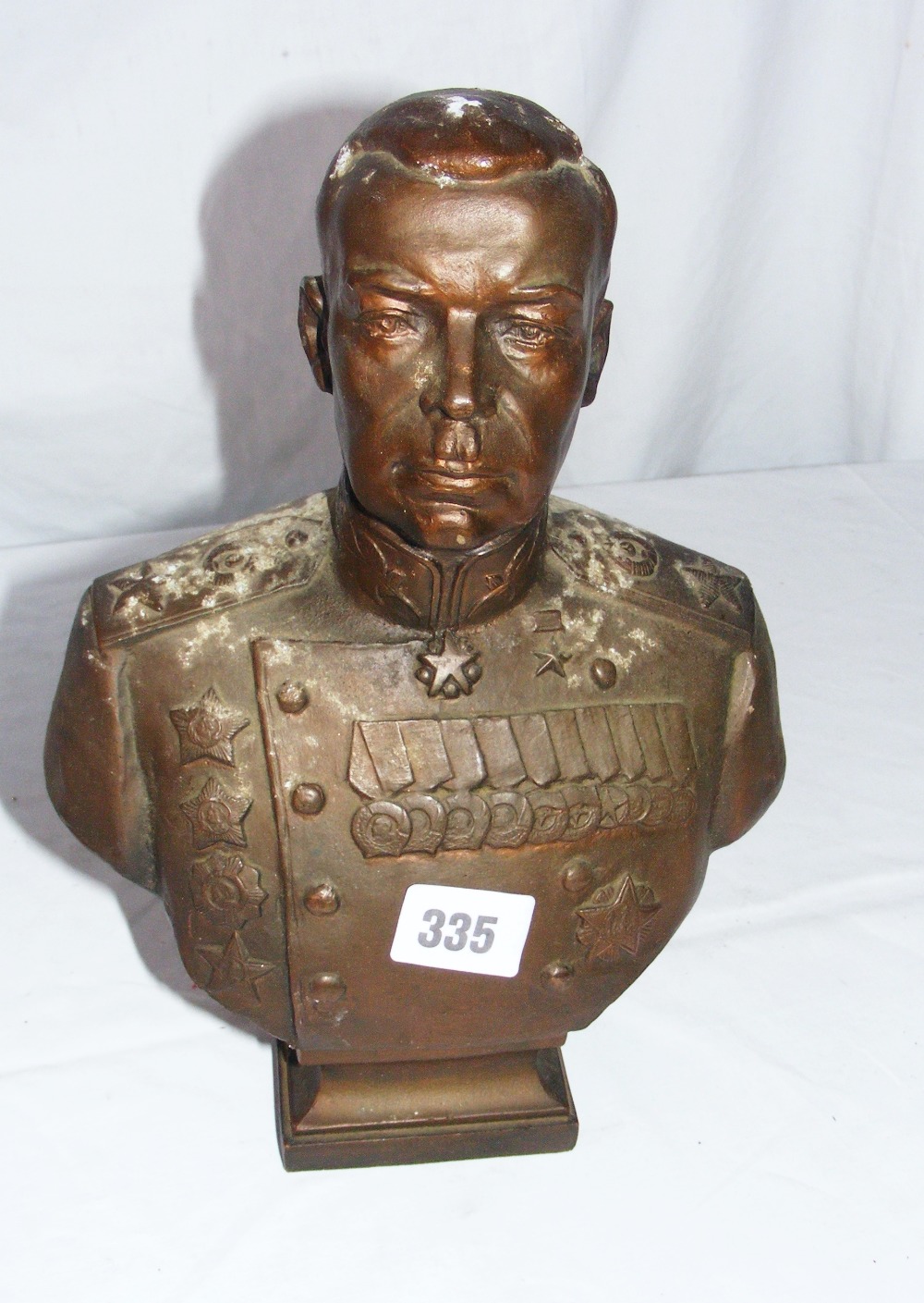 A Military signed bust in a bronze type metal signed & dated to the reverse.