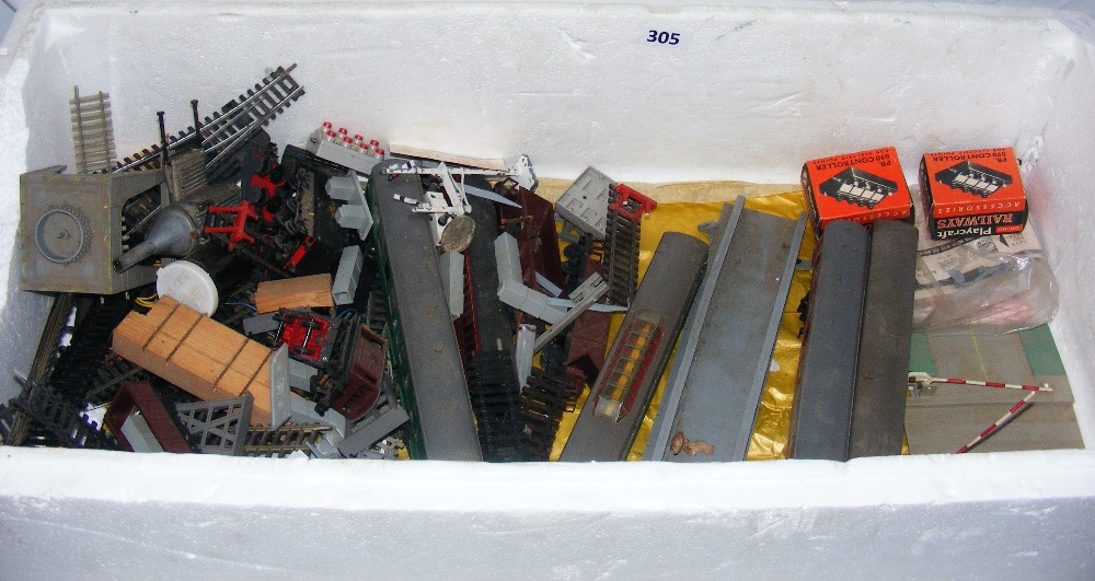 A box of 00 Gauge track, carriages etc.