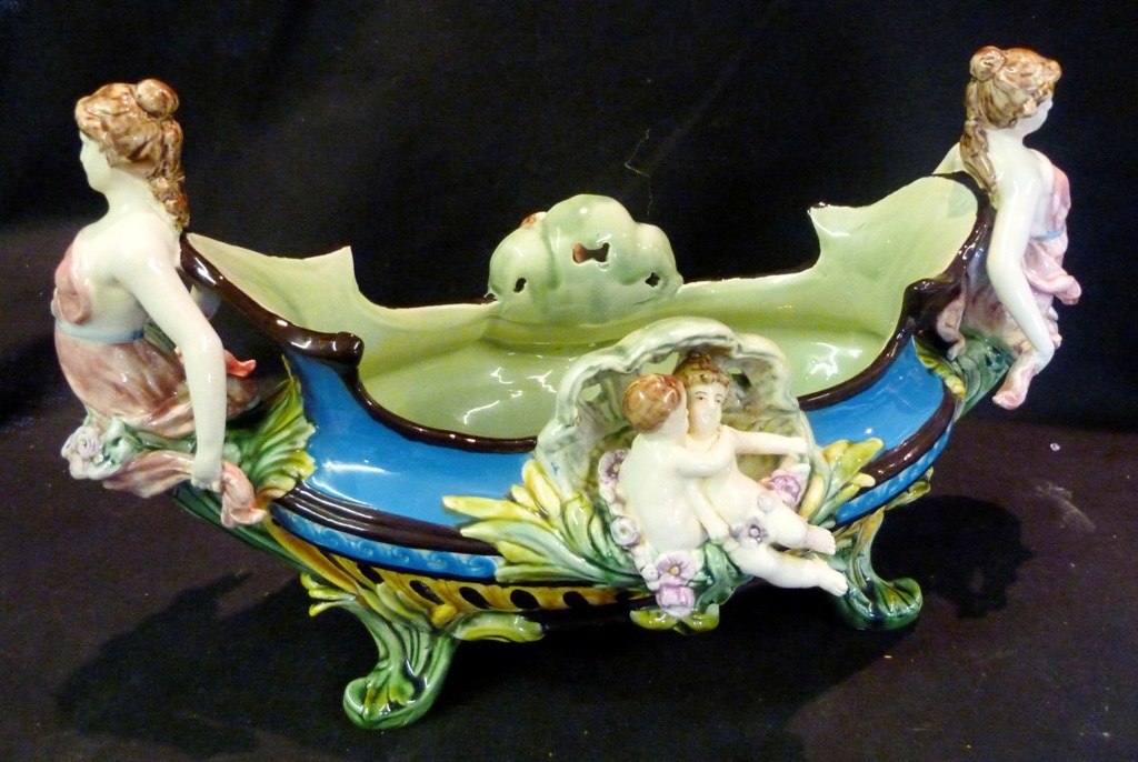 A Majolica Oval Bowl with Figural Mounts, 46 cms long