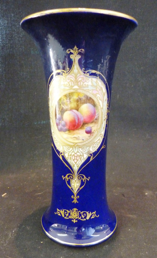 A Royal Worcester Flared Rim Vase, with a reserve depicting peaches and grapes within a gilded