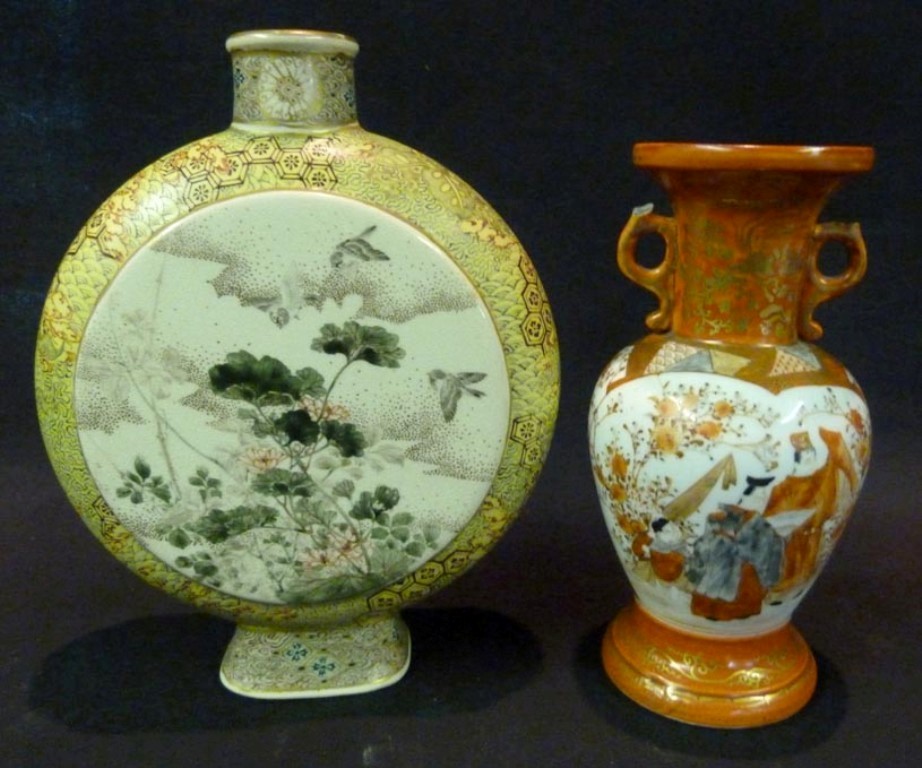 A Japanese Satsuma Pilgrim Flask, decorated with exotic birds amongst foliage, 18½ cms high,