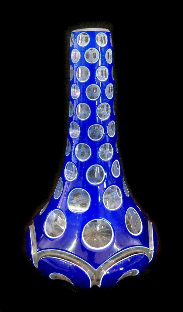 A 19th Century Bohemian Overlaid Blue Glass Vase, 16 cms high