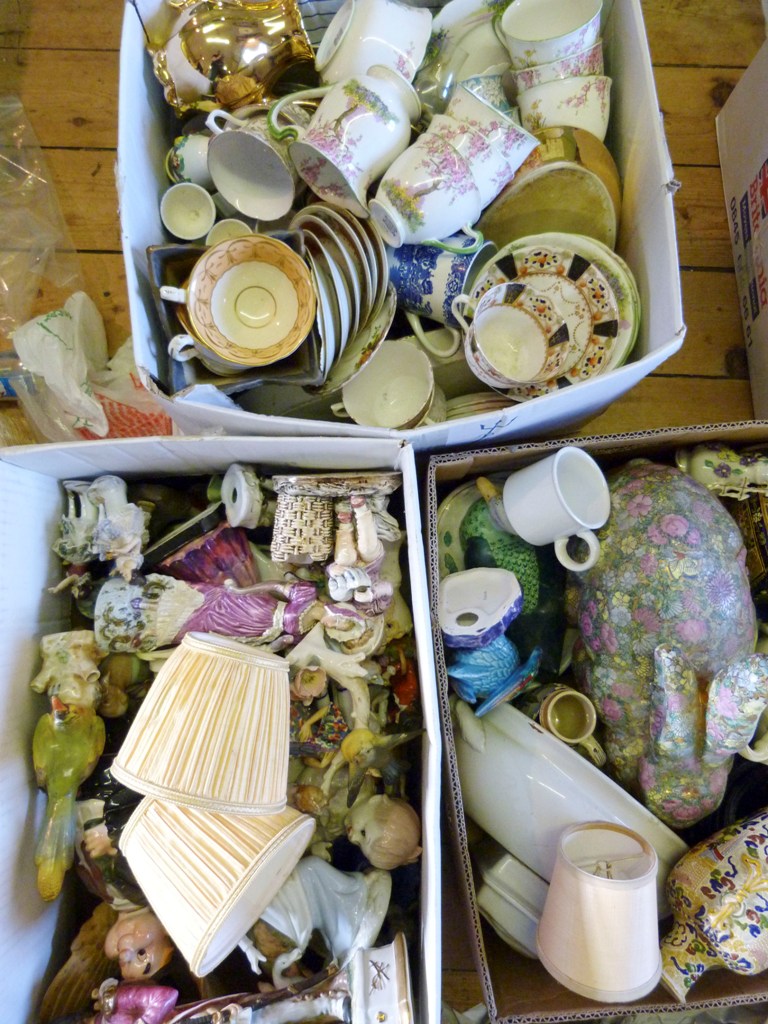 A Large Collection of Ceramics within three boxes, to include continental figures, tea ware and