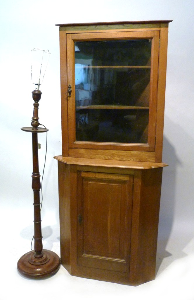 An Oak Standing Corner Cabinet, together with a mahogany lamp standard