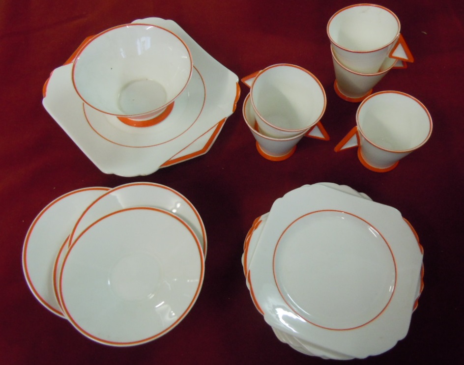 `Shelley` White and orange China range including Cups and Saucers (5) Attractive lot.