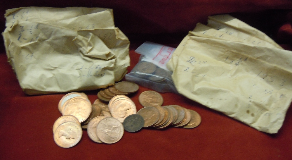 Coins - English copper sorted by year - many coins still wrapped in newspaper!  Good sorting