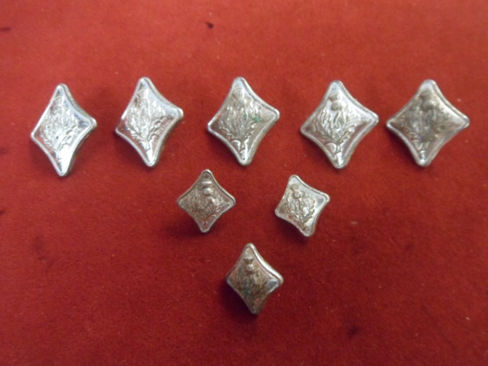 White Metal Highland Regalia Buttons, diamond shaped, thistle emblem (5 large, 3 small).