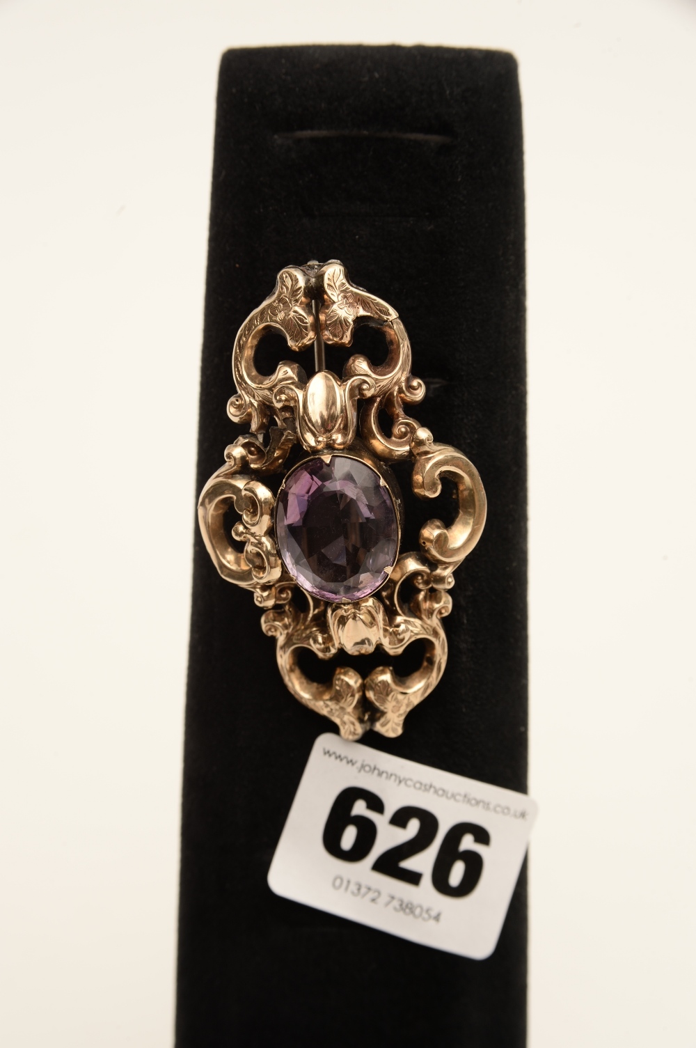 19th century stone set dress brooch in gilt metal