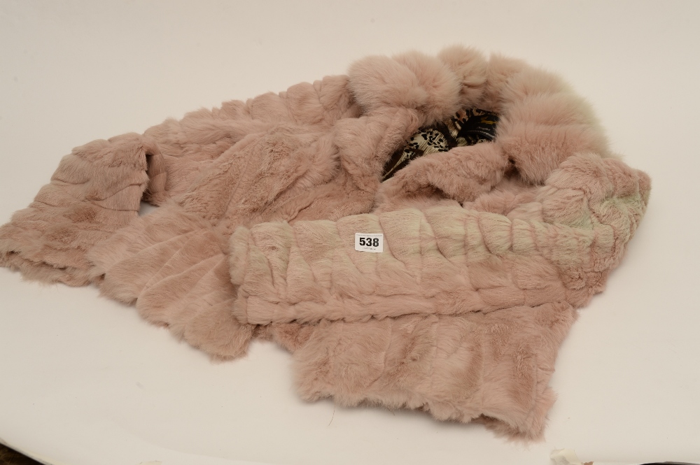 a ladies dyed rabbit fur short jacket by donghu (arm faded)