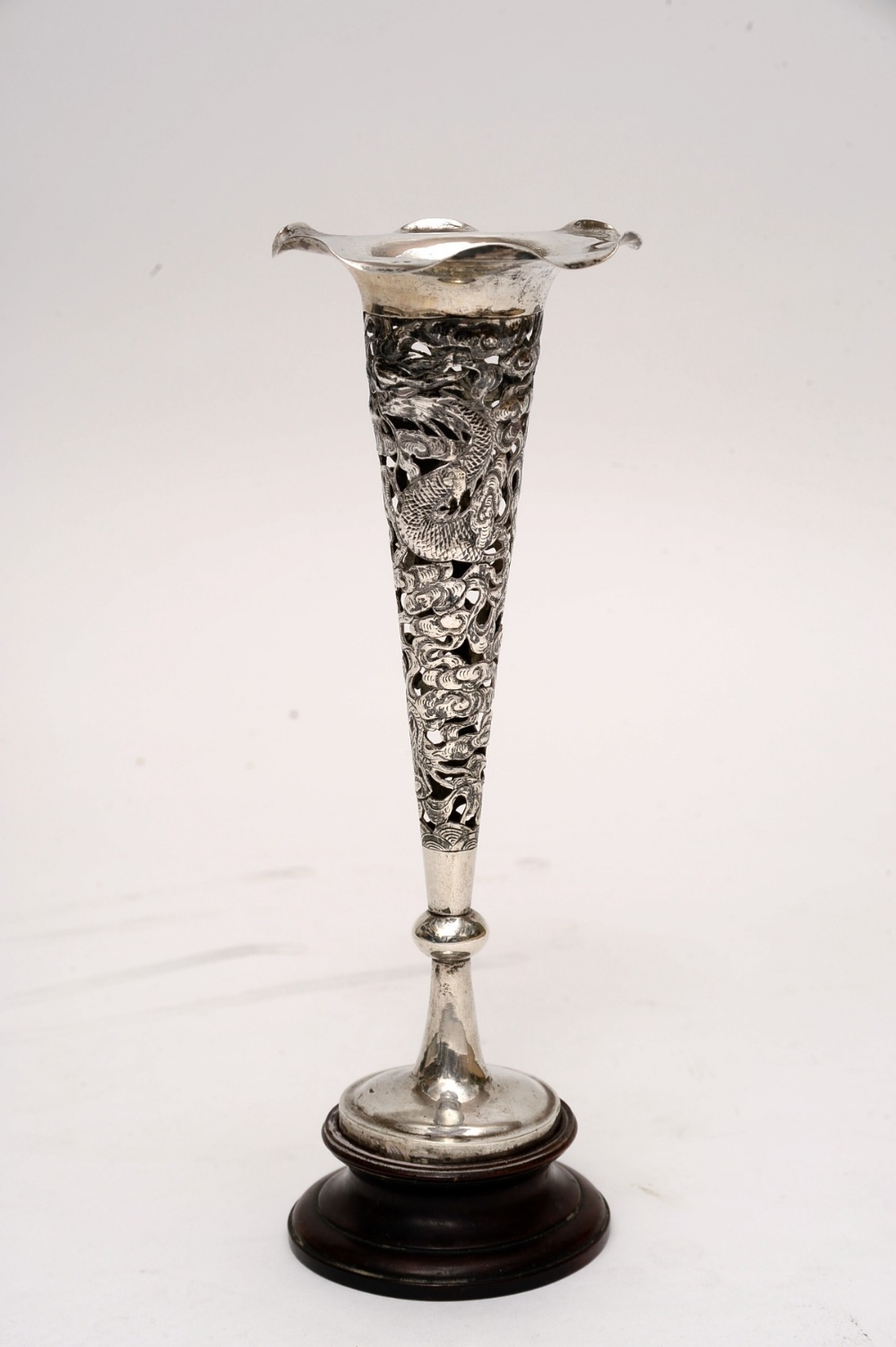 an oriental silver Chinese marks specimen vase with pierced and engraved decoration of entwined