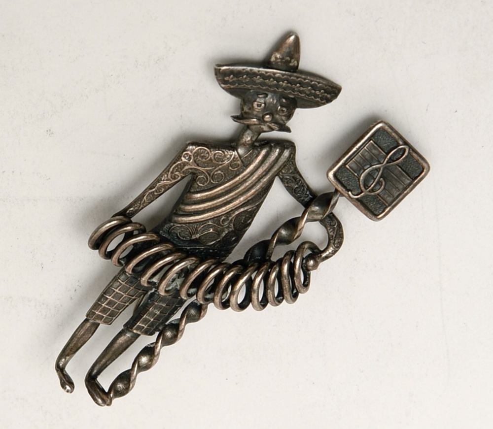 silver musician brooch