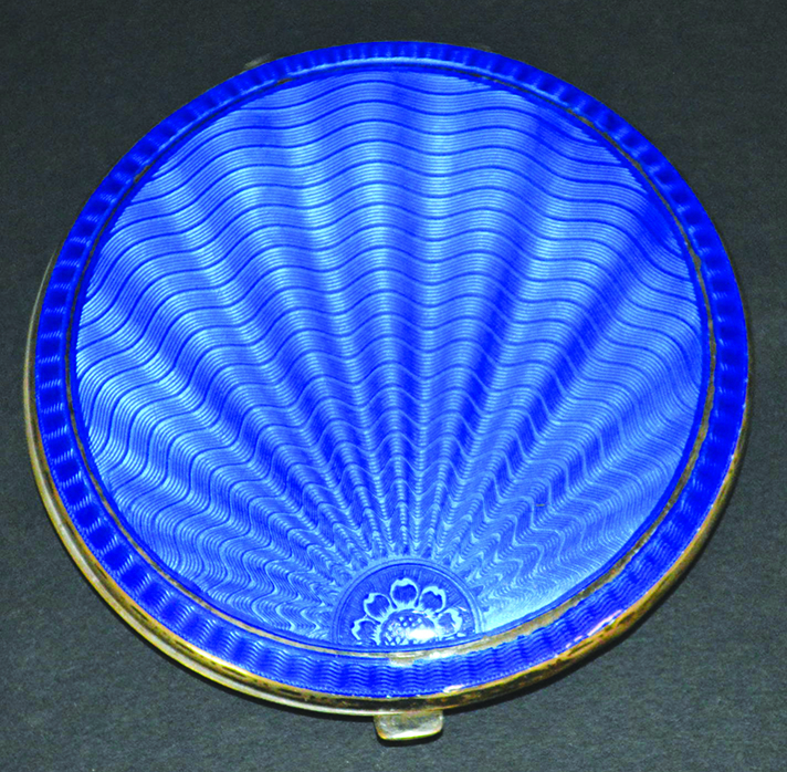 A BLUE ENAMEL AND SILVER CIRCULAR COMPACT. Birmingham 1937.