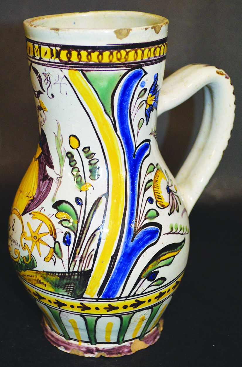 A GMUNDEN AUSTRIAN FAIENCE JUG painted with `S. Katharina`, with a border inscribed F.M, the foot