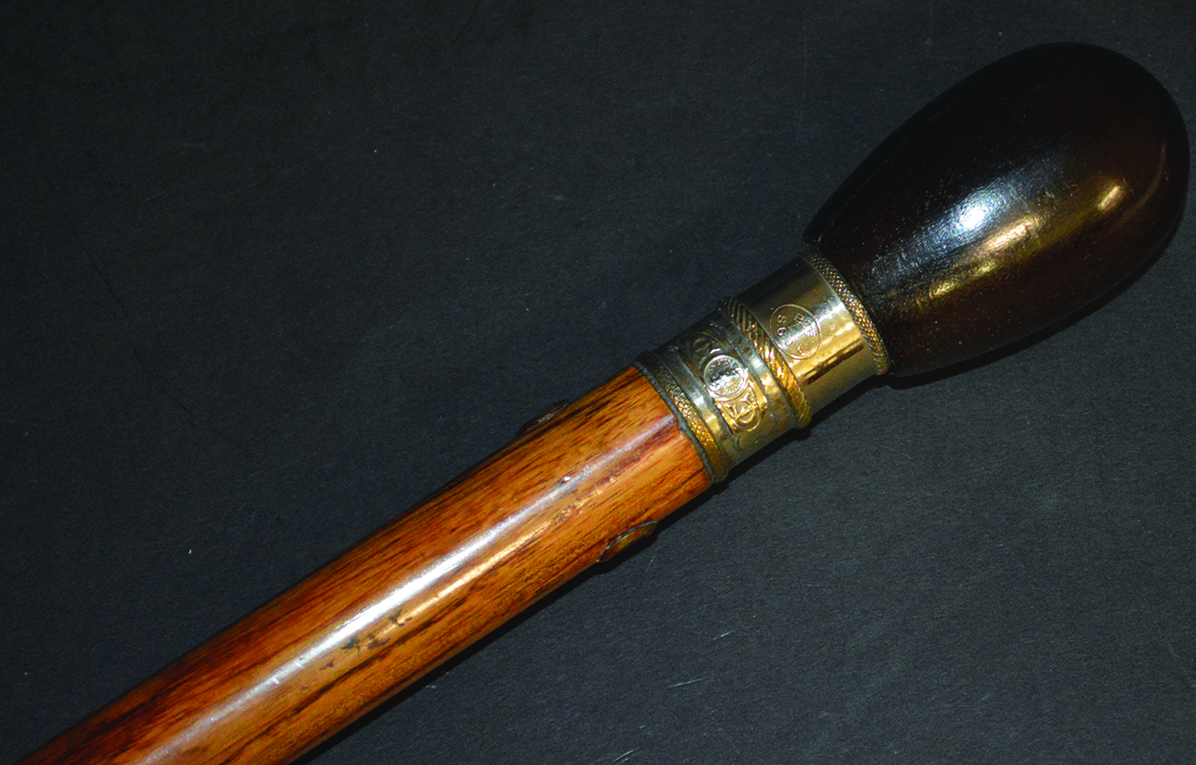 AN UNUSUAL PATENT CIGARETTE LIGHTER WALKING STICK, FRENCH, CIRCA. 1910, the hardwood top unscrewed