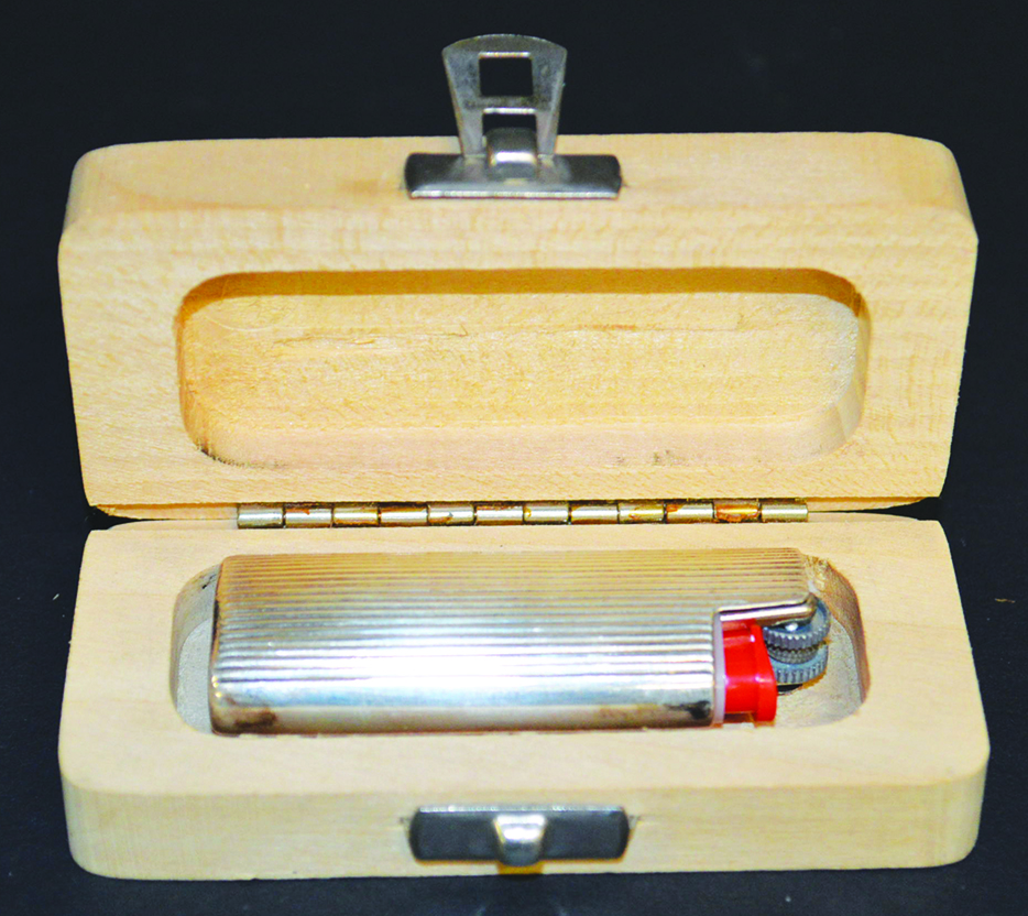 A .925 SILVER LIGHTER in a wooden box.