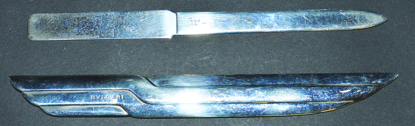 A TIFFANY STERLING SILVER KNIFE AND A BULGARI KNIFE.