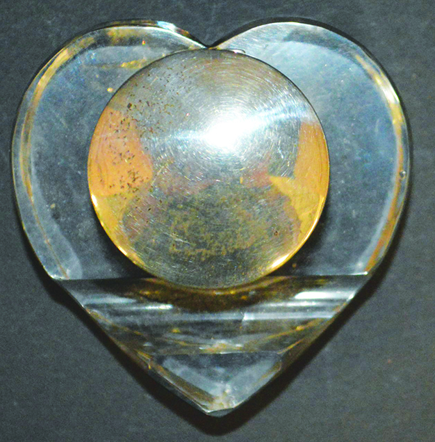 A HEART SHAPED GLASS SILVER MOUNTED INKWELL.