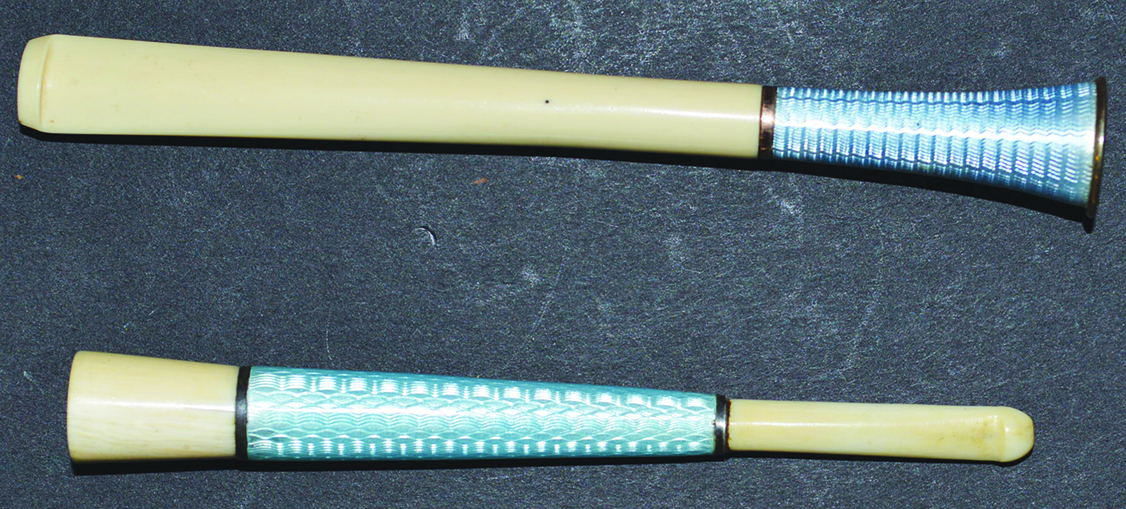 TWO IVORY AND ENAMEL CIGARETTE HOLDERS.