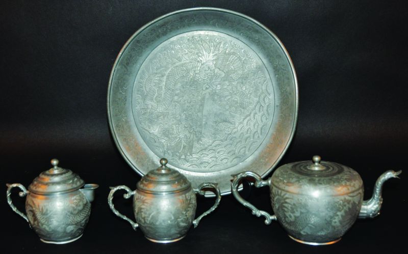 A CHINESE EARLY 20TH CENTURY PEWTER TEA SET, comprising a teapot and cover, sugar basin and cover,