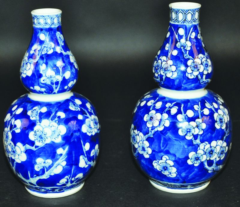 A PAIR OF 19TH CENTURY CHINESE BLUE & WHITE PORCELAIN DOUBLE GOURD PORCELAIN PRUNUS VASES, 7.4in