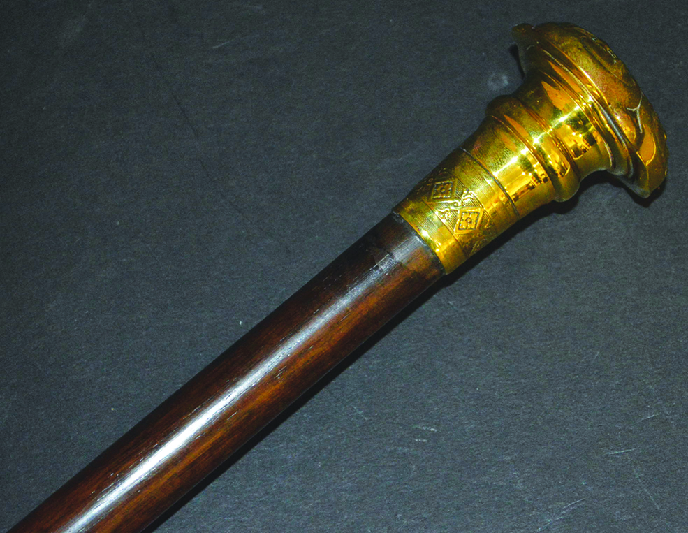 AN ART NOUVEAU METAL TOPPED CANE, ENGLISH, CIRCA. 1890 36ins long.