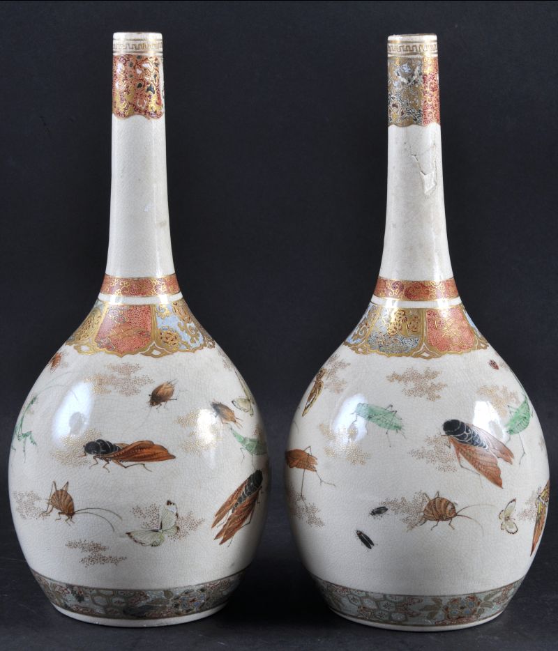 A PAIR OF EARLY 20TH CENTURY JAPANESE MEIJI PERIOD SATSUMA VASES painted with insects, 11.5ins