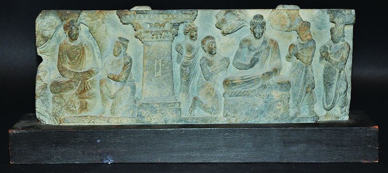 AN EARLY INDIAN GANDHARA GREY SCHIST FRIEZE, probably 3rd/4th Century, deeply carved with Buddhist