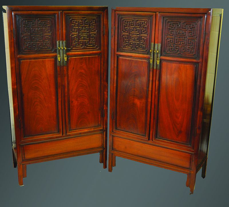 A RARE PAIR OF 18TH/19TH CENTURY CHINESE HUANGHUALI STANDING CABINETS, of Fangjiaogui form, each