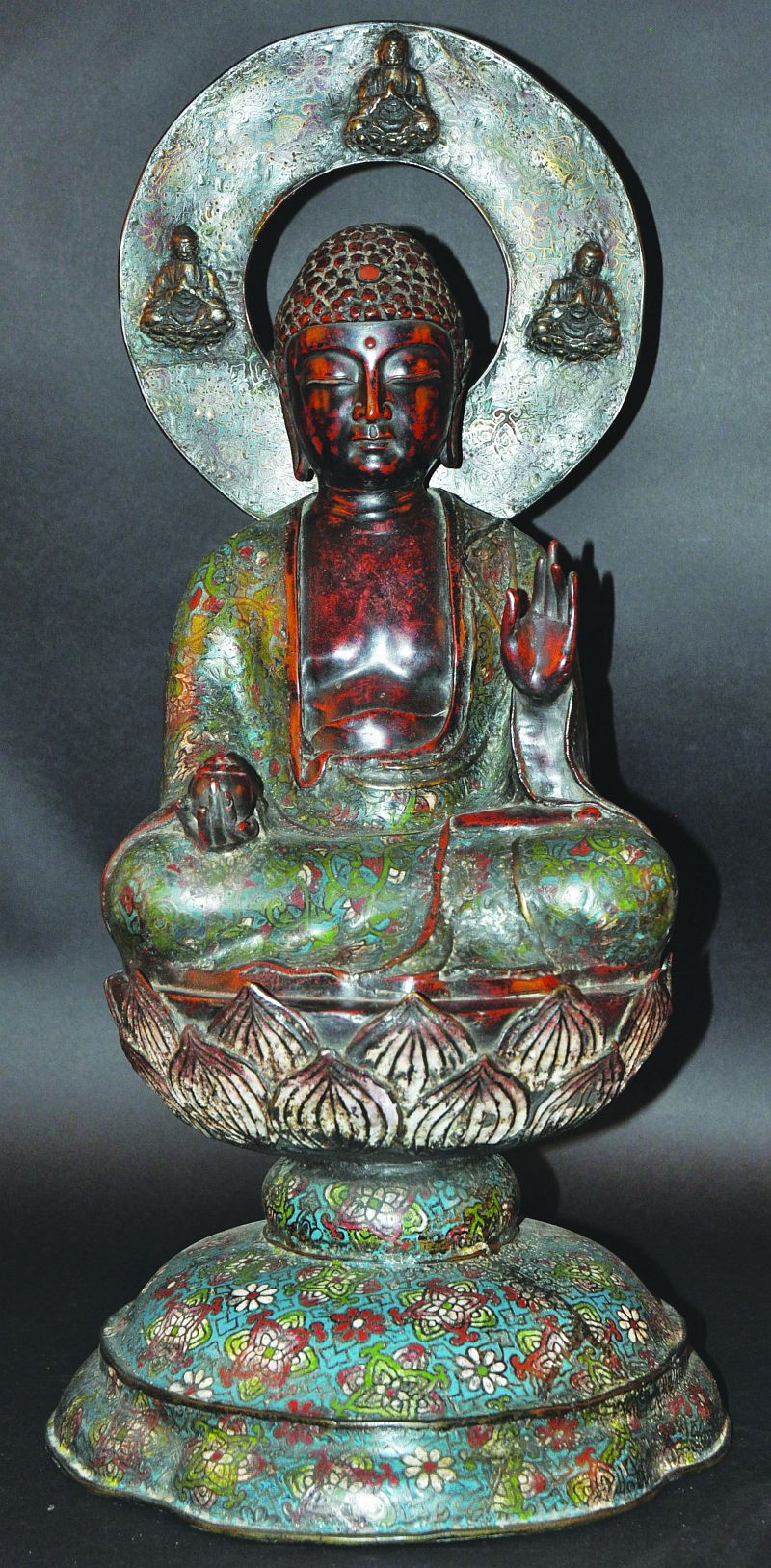 A LARGE 18TH/19TH CENTURY ORIENTAL BRONZE & CHAMPLEVÉ FIGURE OF BUDDHA, seated on a lotus plinth,