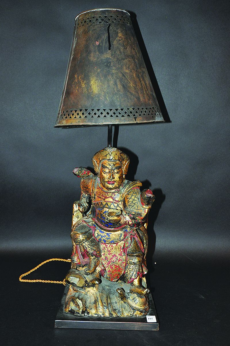 A LARGE 19TH CENTURY CHINESE LACQUERED, GILDED & CARVED WOOD FIGURE OF ZHENWU, seated on a