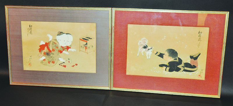A PAIR OF EARLY 20TH CENTURY JAPANESE FRAMED WOODBLOCK PRINTS, depicting playing children, the