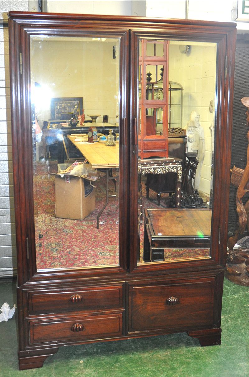 AN EARLY 20TH CENTURY CHINESE HARDWOOD WARDROBE WITH MIRRORED DOORS, 6ft 3in x 4ft.