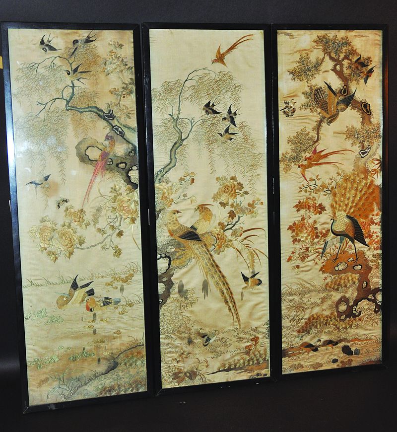 A SET OF THREE 19TH CENTURY CHINESE FRAMED AND EMBROIDERED SILK PANELS, each variously worked in