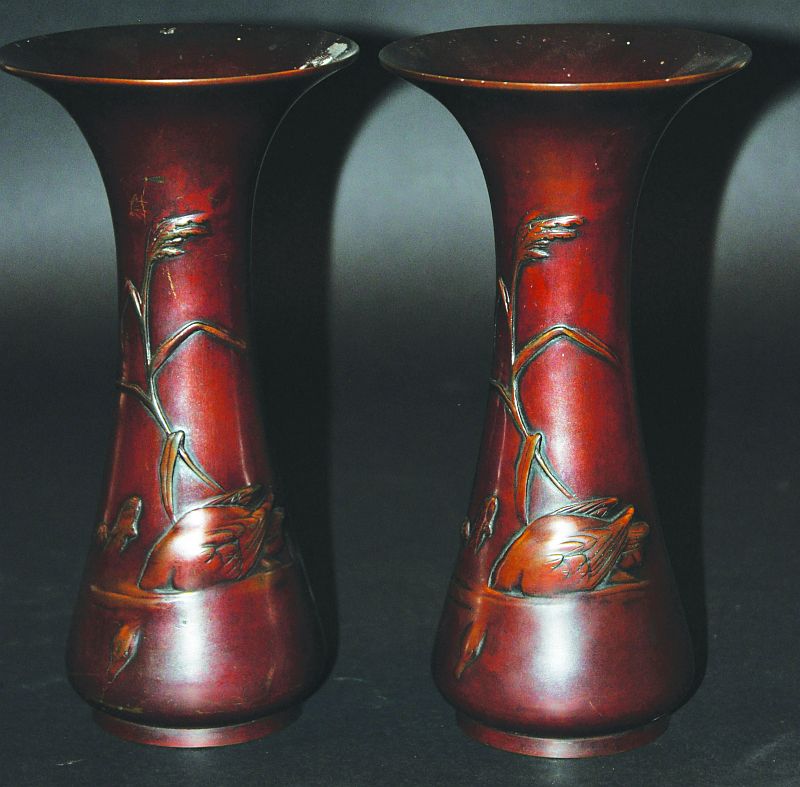 A PAIR OF EARLY 20TH CENTURY JAPANESE MEIJI PERIOD BRONZE VASES, unsigned, each vase decorated