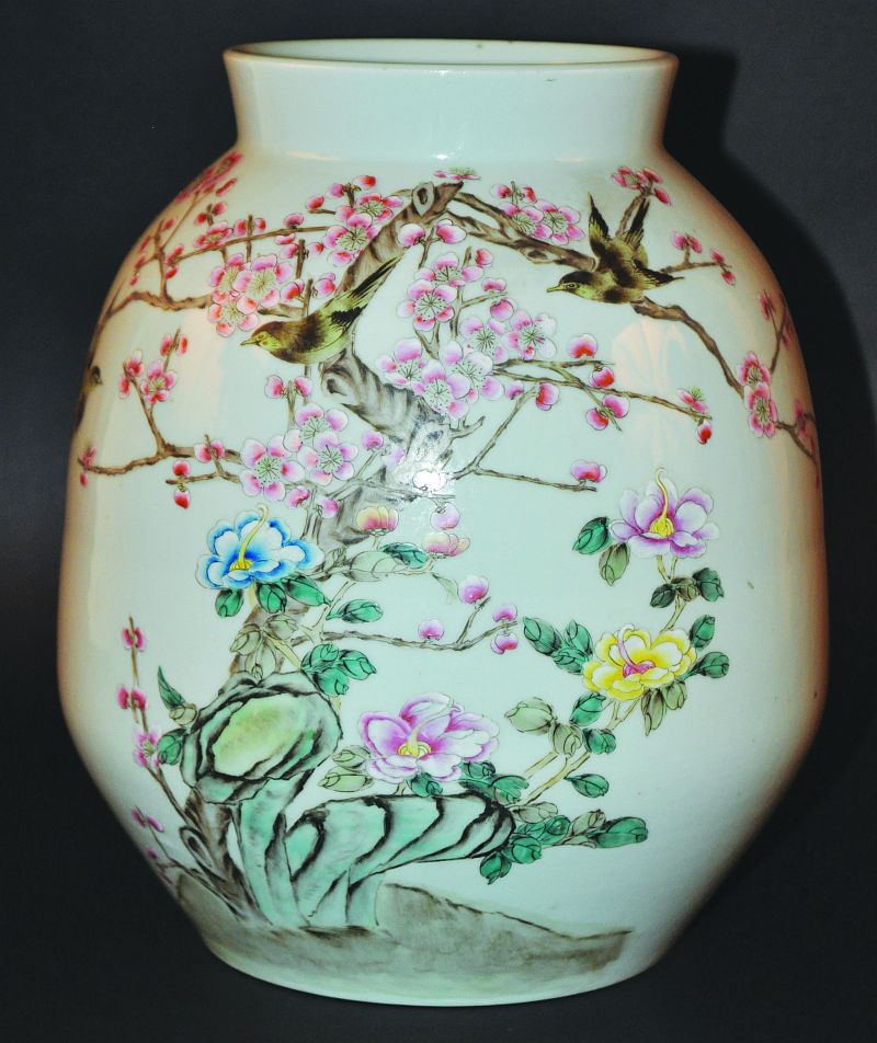 A LARGE CHINESE FAMILLE ROSE PORCELAIN VASE, the sides painted with birds perched in a blossom-