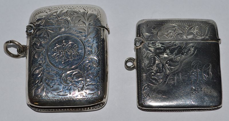 TWO SMALL VICTORIAN ENGRAVED VESTA CASES, Birmingham 1896 and 1900.