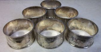 Set of 6 silver napkin rings marked 'sterling' total weight 3.38 oz.