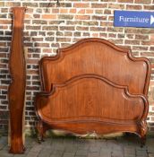 Ornately carved French mah double bed