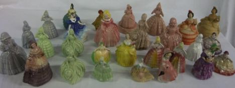 Various figurines of crinoline ladies