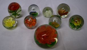 9 various paperweights