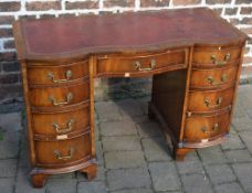 Reproduction serpentine fronted desk