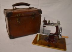 Miniature sewing machine with case