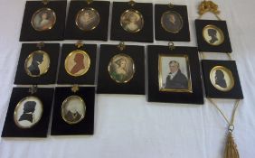 12 miniatures in black frames