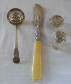 Silver sugar spoon Sheffield 1909, butter knife Birmingham 1850, Glass bottles Birmingham 1898 &
