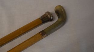 9ct gold collared walking stick and a poss silver topped cane