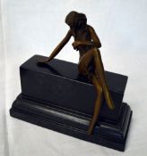 After Aldo Vitaleh a bronze figure of a lady sitting