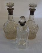 3 glass decanters with silver cuffs Birmingham 1937 & 1908