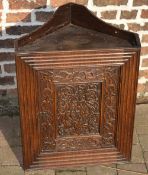 Carved oak corner cupboard